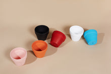 Load image into Gallery viewer, Colorful terracotta planter pots with a matte finish. The planter pots includes a drainage hole.
